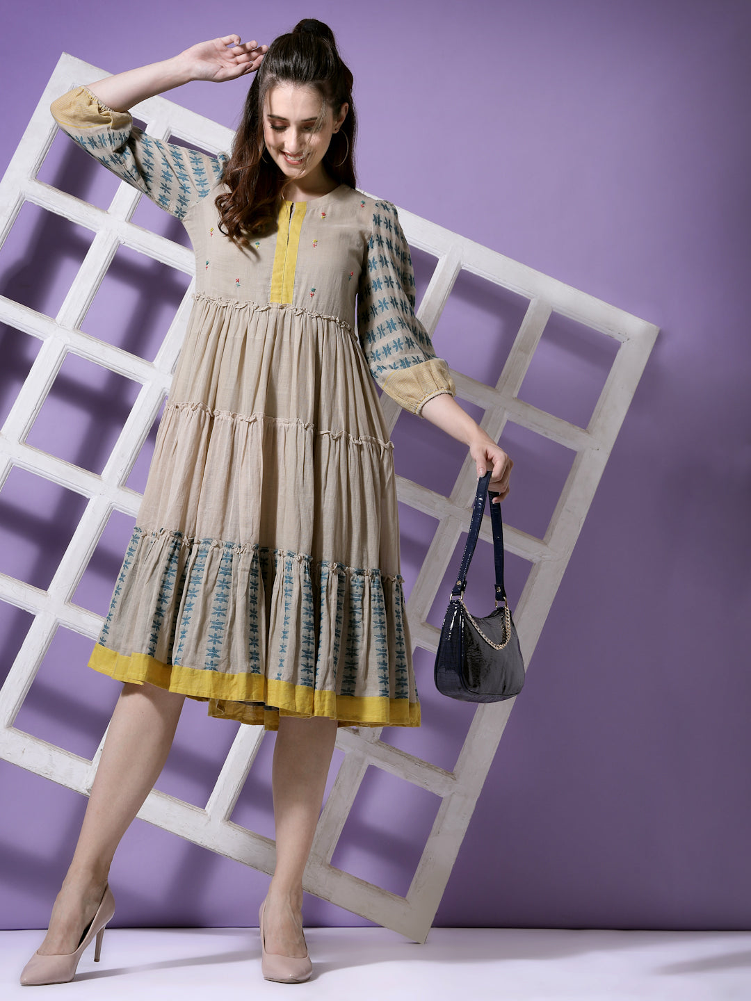Terquois Beige Woven A-line Dress with Ruffle detail and has a Round-neck Dresses TERQUOIS   